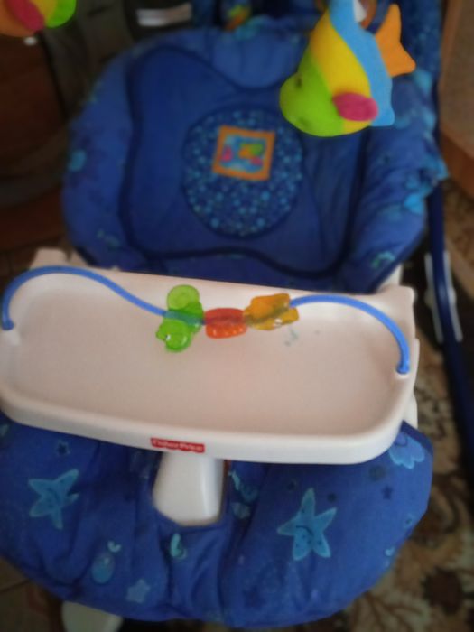 Заколисуючий центр, гойдалка дитяча