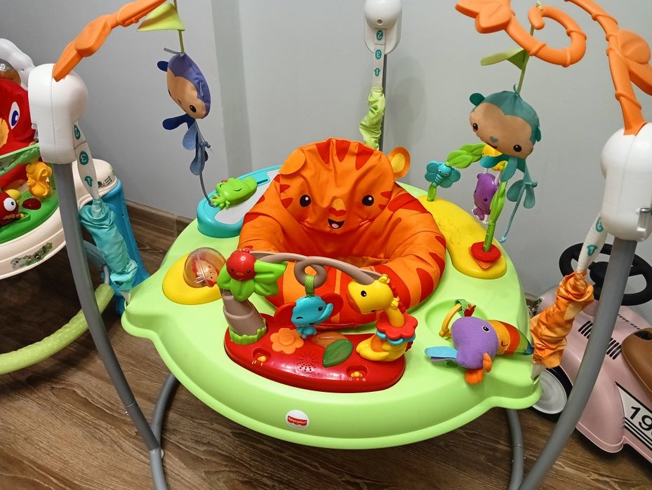 FISHER PRICE skoczek z dźwiękami Wesoła dżungla Jumperoo