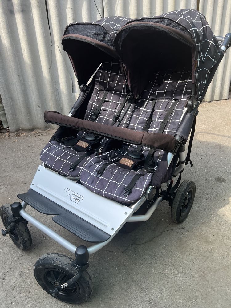 Продам коляску для двойни Mountain Buggy