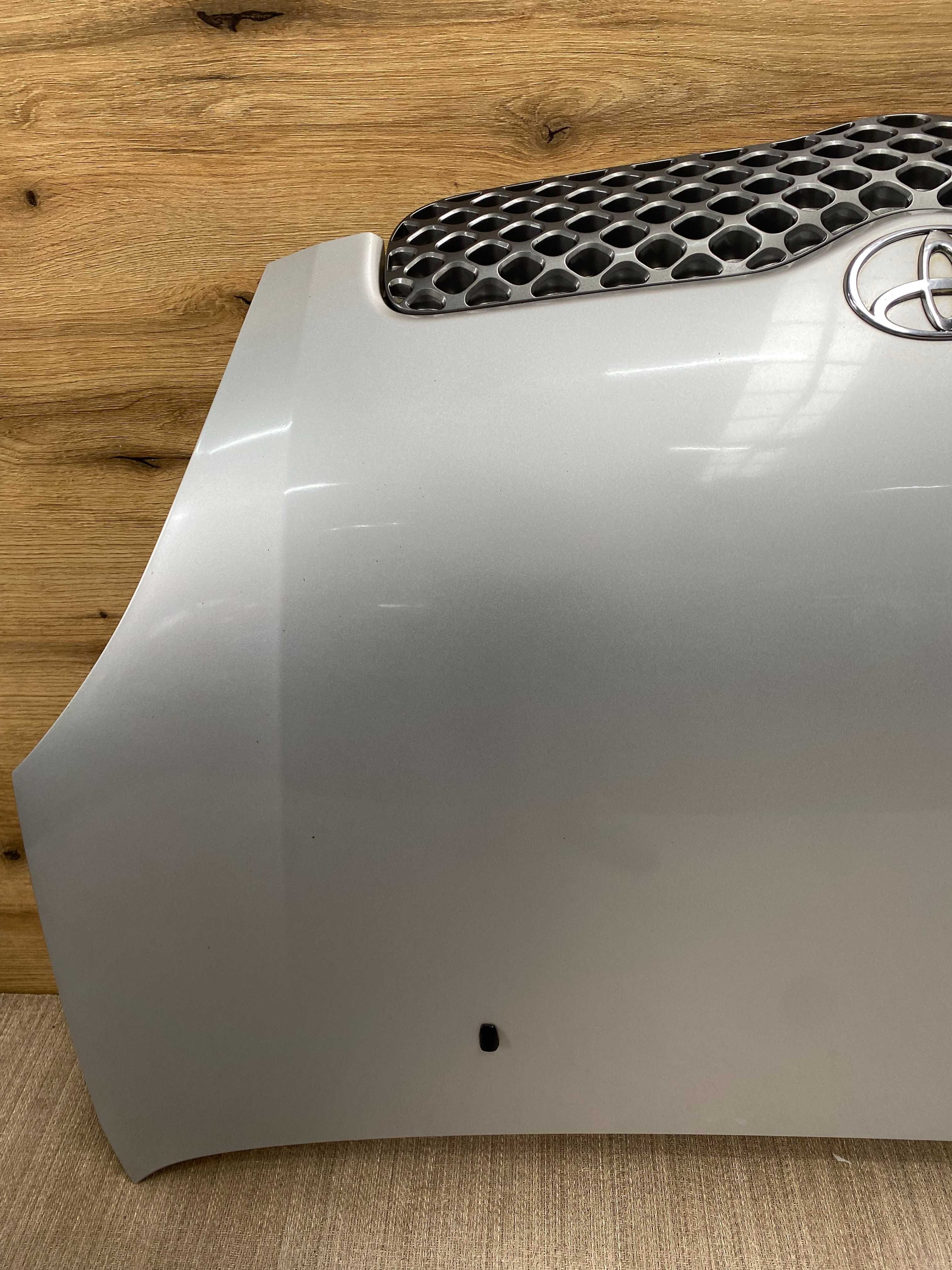 Maska Toyota Yaris I Lift kolor 1e7