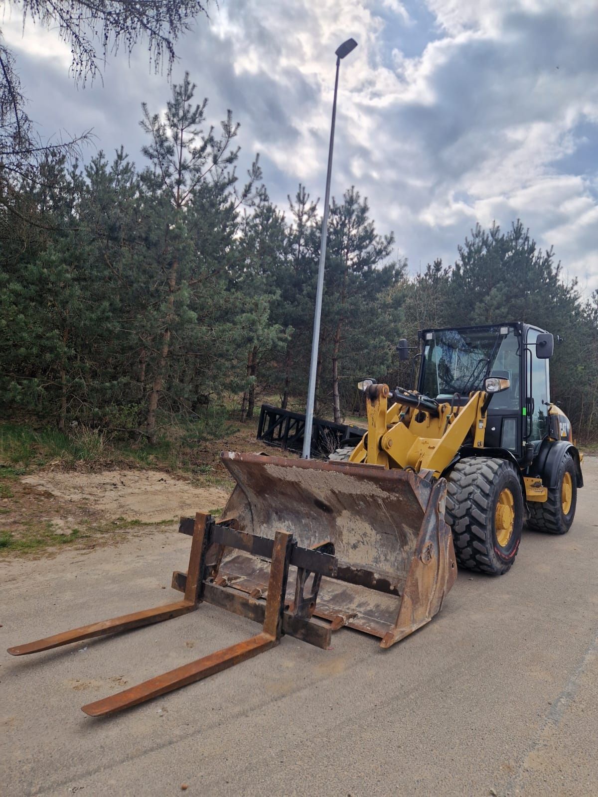 Ładowarka Caterpillar 906 H2 rok 2015