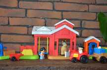 stajnia Fisher Price + traktor z przyczepką Fisher Price