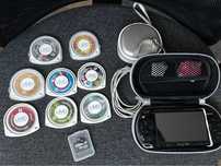 PSP Playstation Portable with 8 Games, Charger,Cases and 8Gb Card.