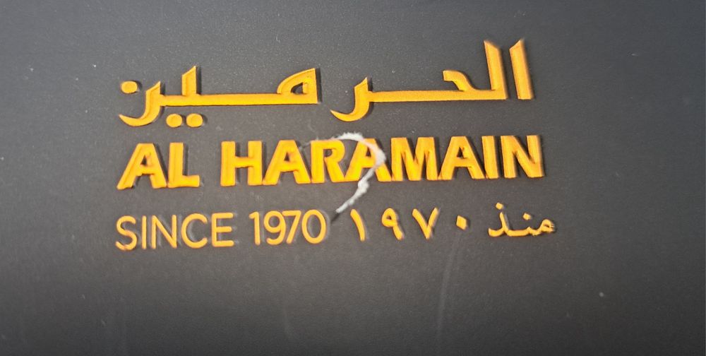 Butelka, flakon po perfumach Haramain Tanasuk