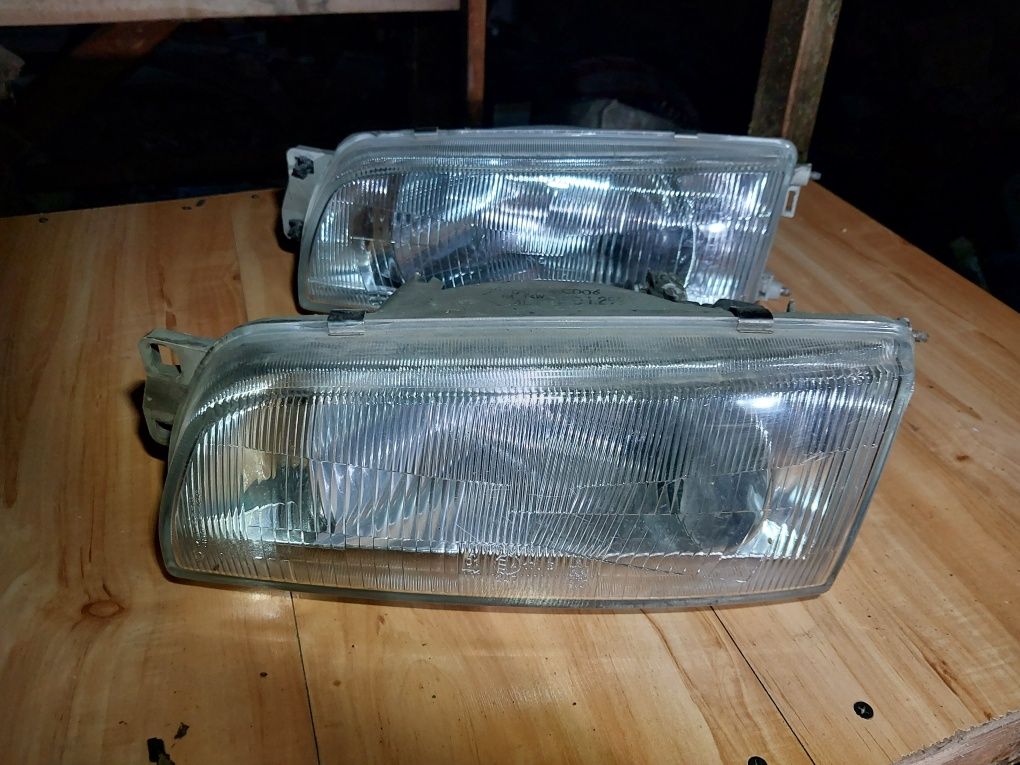 Lampa lewa przód przednia mitsubishi lancer v