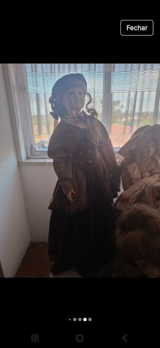 Bonecas em porcelana