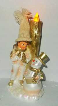 Świecznik Led statuetka z figurkami bajkowymi złoto - perłowa Kolekcja