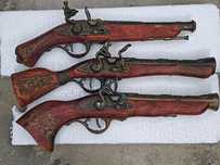 Pistolas decorativas.