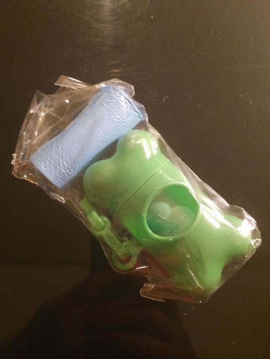 Sacos e dispensador de sacos para cócó