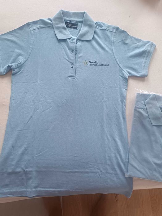 Dwie błękitne nowe polówki