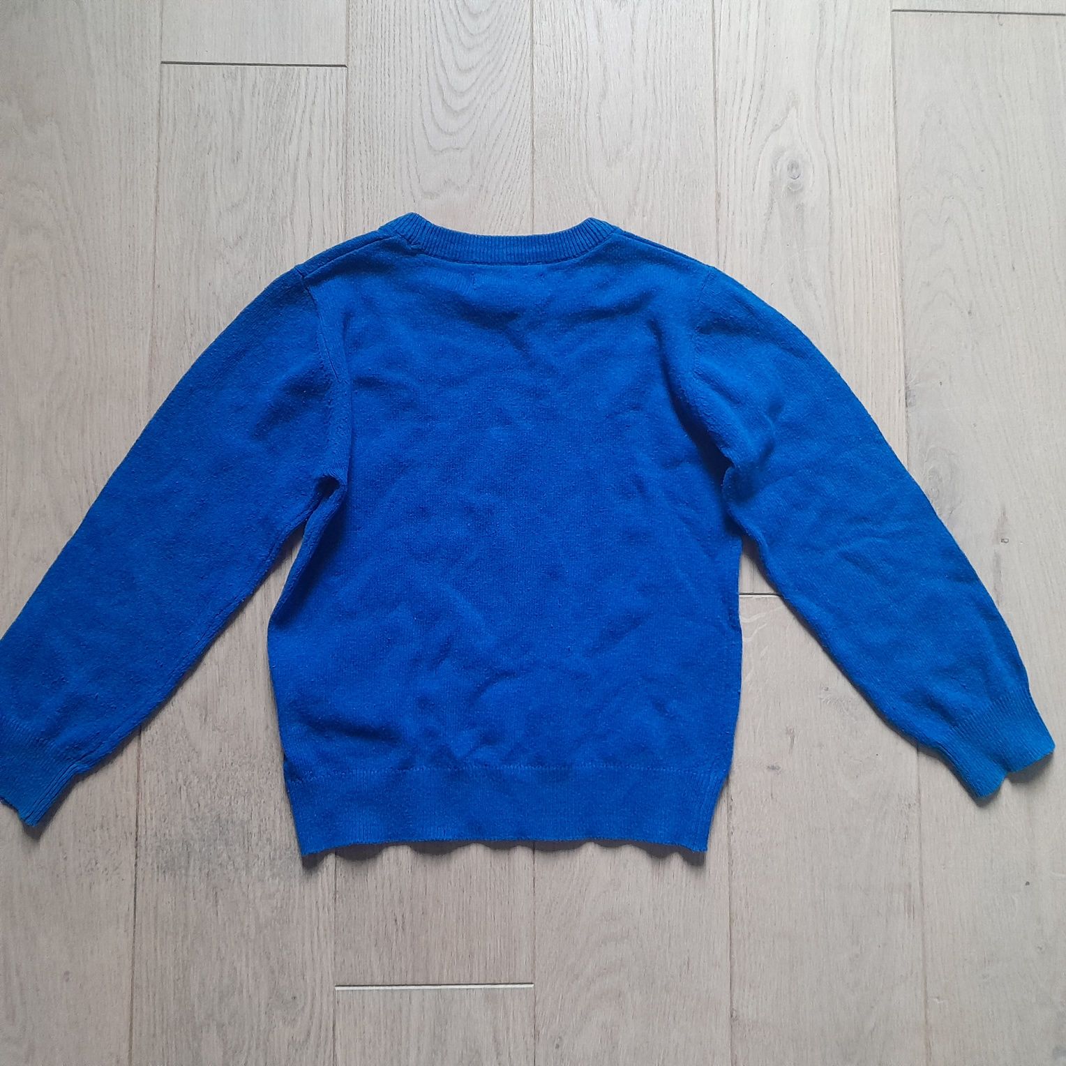 Sinsay niebieski sweterek dla chłopca z dinozaurem next 98-104