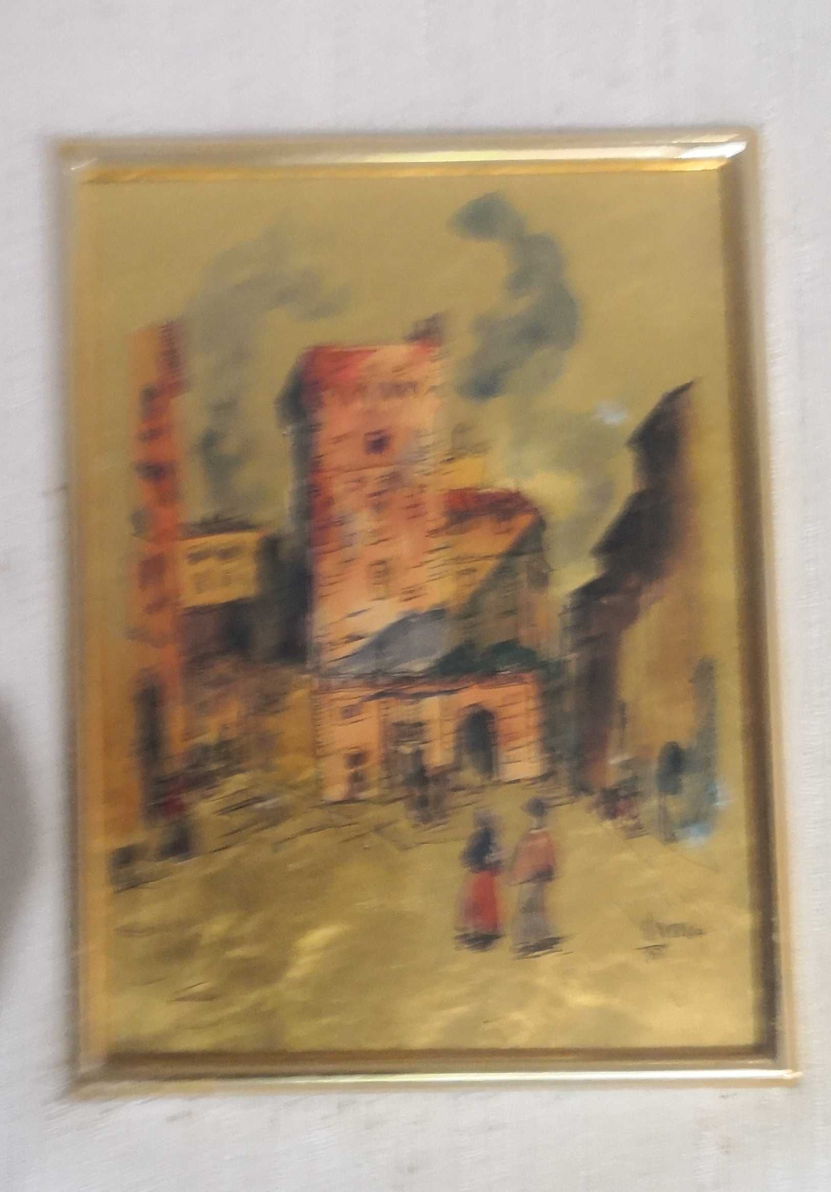 Quadros com gravuras de fundo dourado