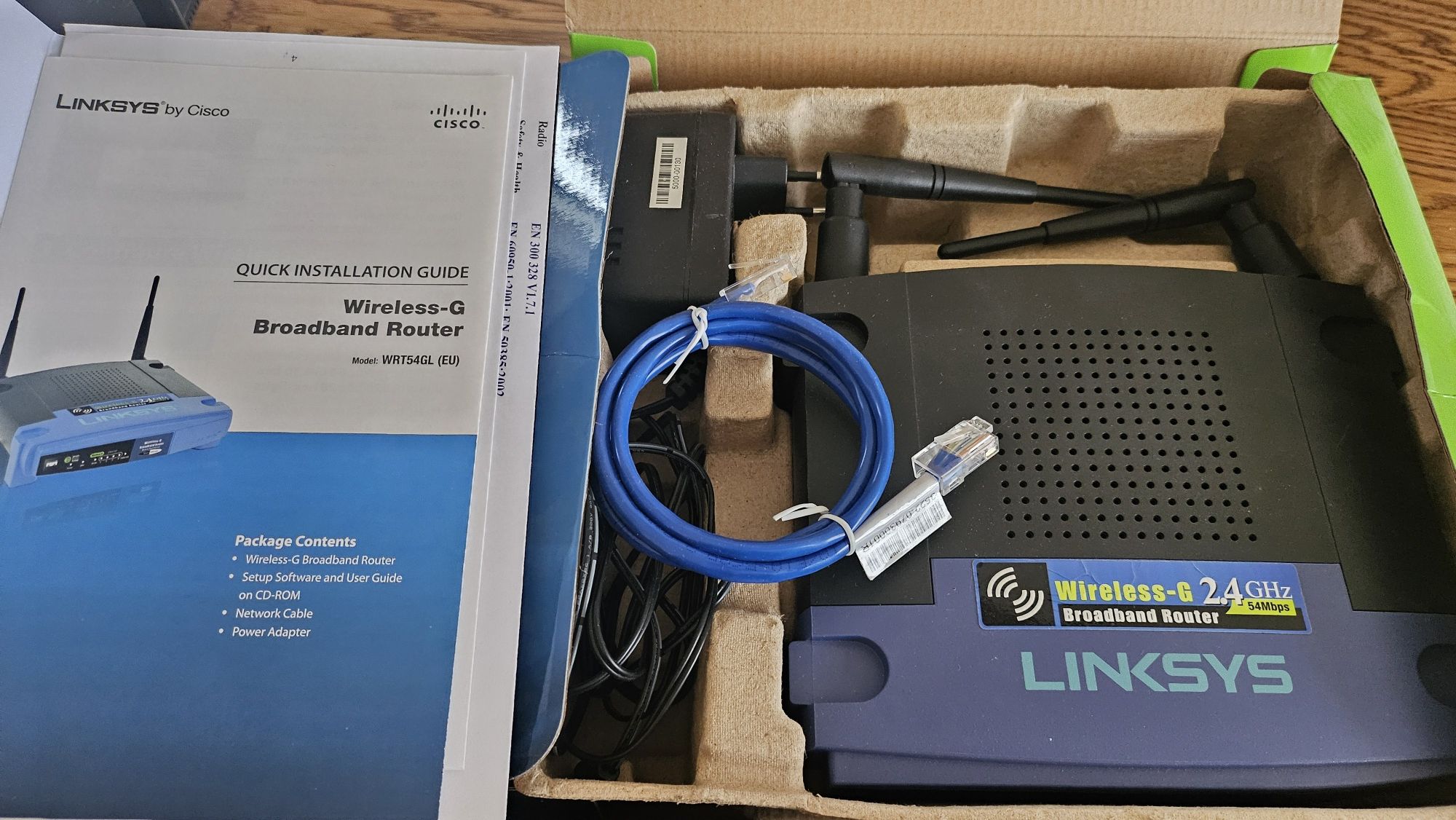 Router Linksys WRT54GL i D-Link DIR-825
