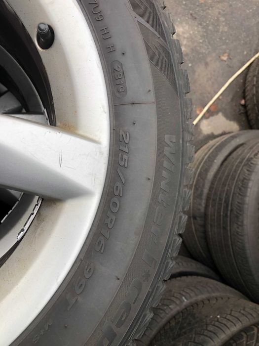 Диски комплект AUDI  A4 2012 року з шинами R16