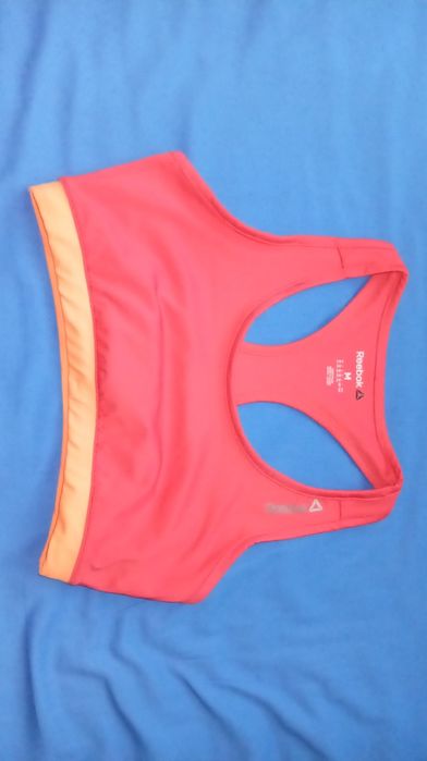 Top Reebok SpeedWick (M) vermelho e laranja.