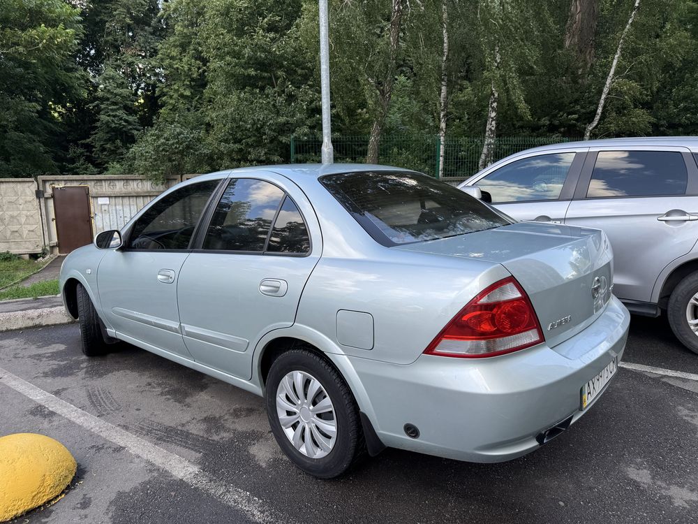 Нисан альмера автомат газ