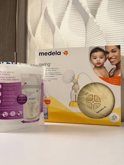 Молокоотсос Medela Sving