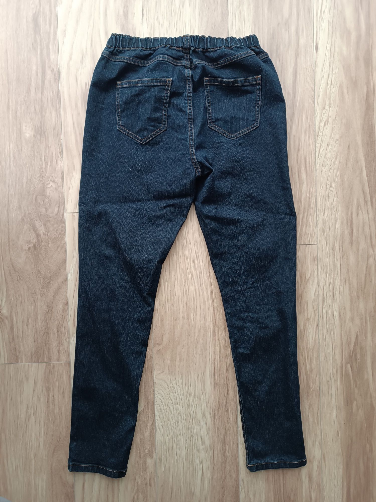Granatowe długie spodnie jeansy jegginsy L 40