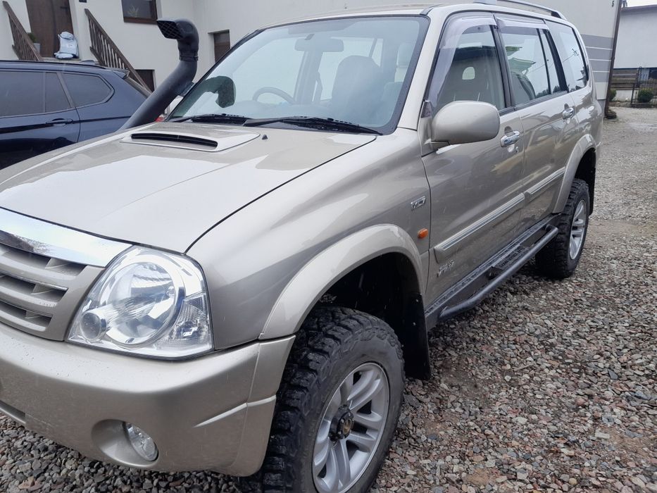 Suzuki grand vitara xl7 progi stalowe z orurowaniem bocznym