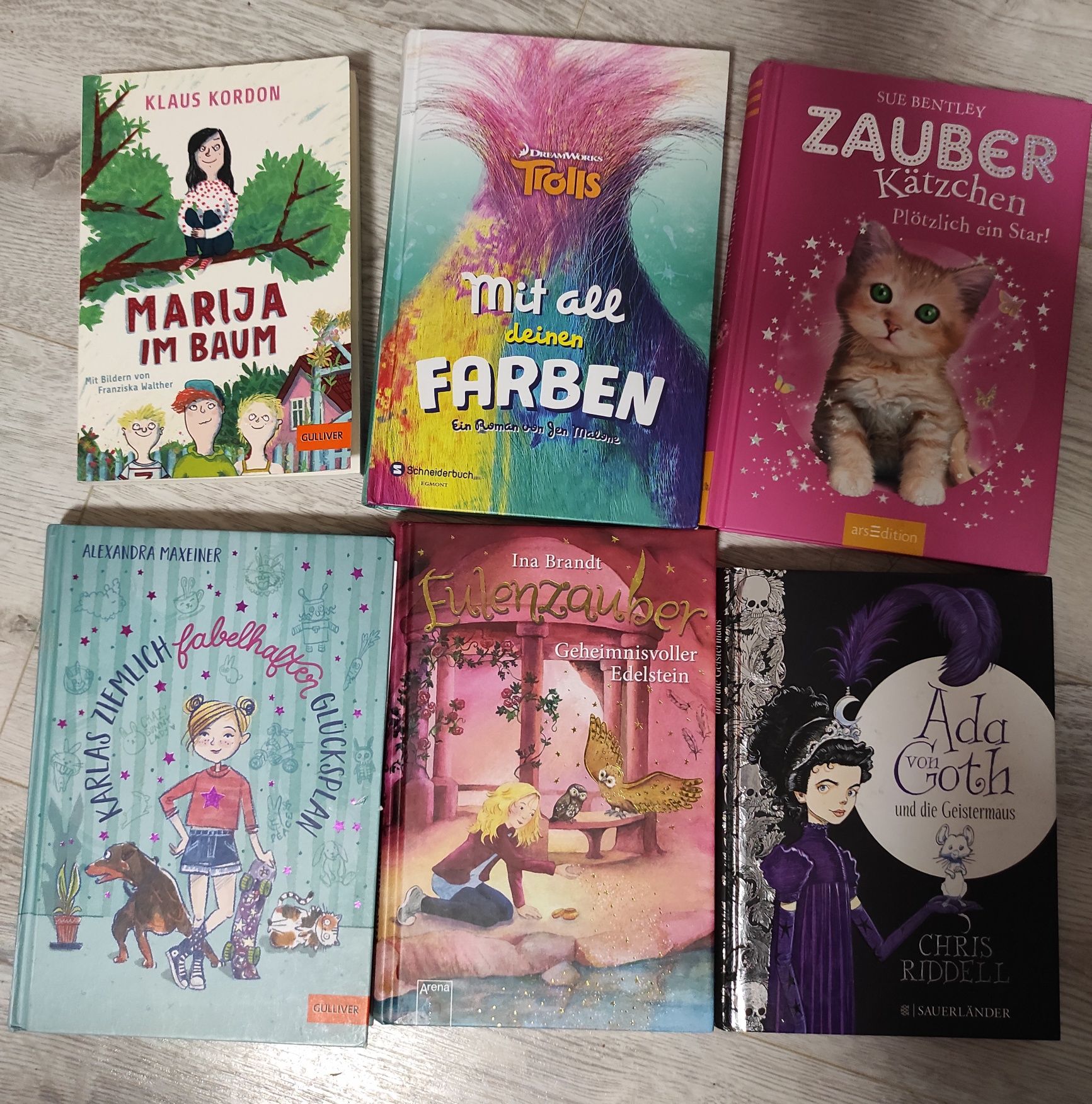Дитячі книги німецькою мовою +подарунок,роман,фентезі .
