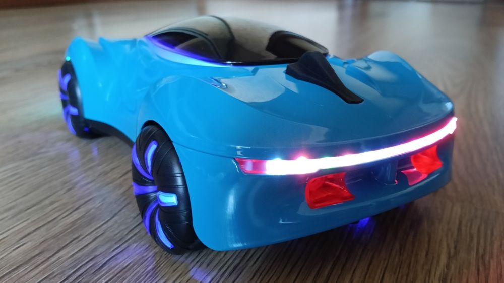 Новинка 2025.іграшка спортивна машинка на пульті  4wd  дим музика дриф