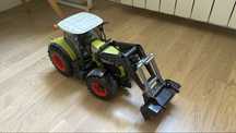 Великий іграшковий трактор claas 950 axion точна модель