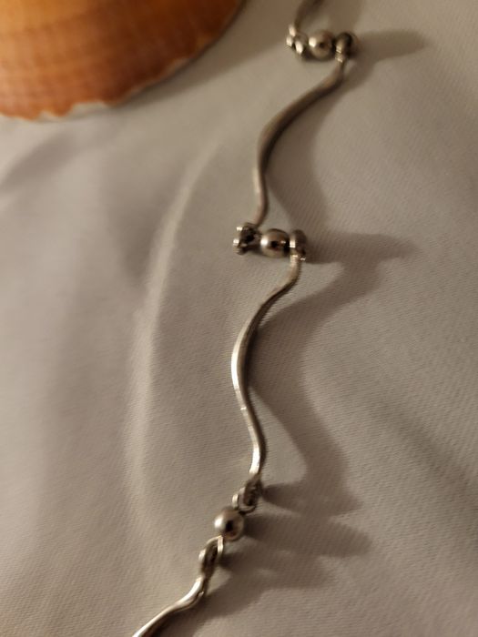 Fio prateado em excelente estado