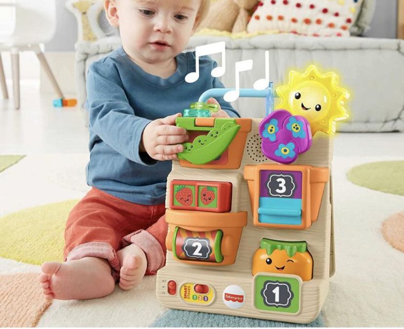 Fisher-price бизиборд музична іграшка