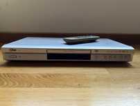 Leitor de DVD, marca LG, prateado.