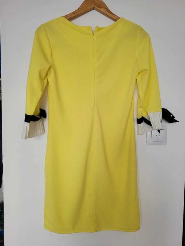 Piękna żółta sukienka z ozdobnymi rękawami S/M
