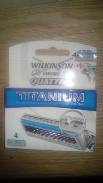 Wilkinson quattro titanium 4 ostrza + trymer - wklad 4 sztuki - nowy
