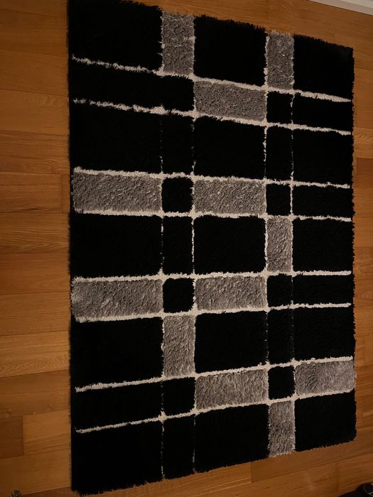 Carpetes em bom estado de conservação