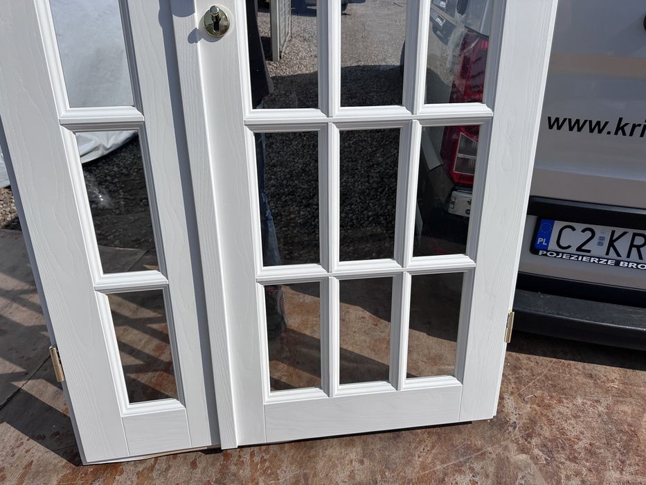 Drzwi wewnętrzne drewniane dwuskrzydłowe białe szpros Montaż c Polska