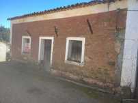 Casa rustica em xisto com terreno e olival