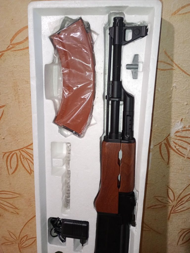 Игрушка автомат .