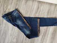 spodnie jeans jeansowe Resalsa 28 S 36 z lampasami z lapmpasem