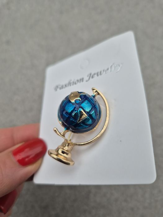 Broszka globus niebieski