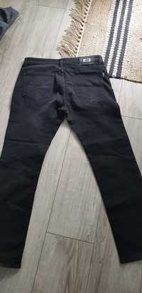 Czarne cienkie meskie jeansy XL