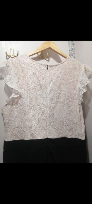 Продам стильний та святковий комбінезон. Розмір 52-54.