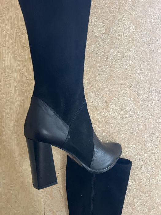 Жіночі сапоги на підборах