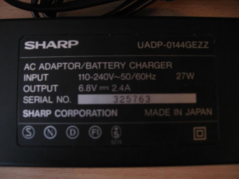 Зарядное устройство для видео камеры Sharp 6,8V 2,4A