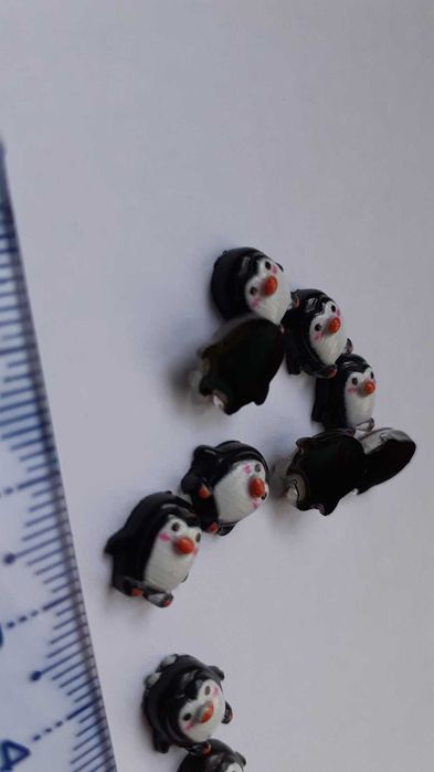 Pinguins em resina miniatura