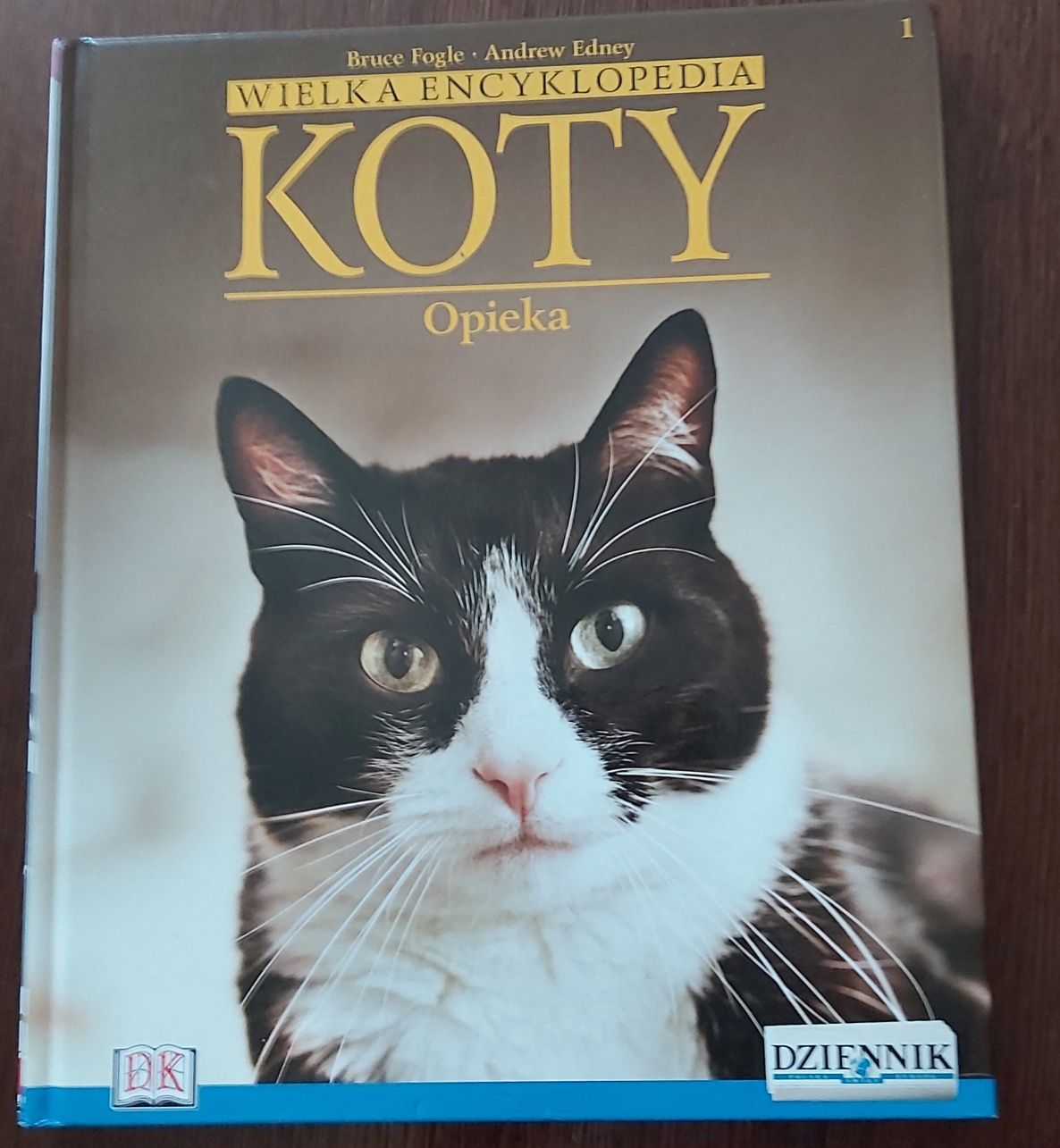 Koty-opieka książka album w twardej oprawie