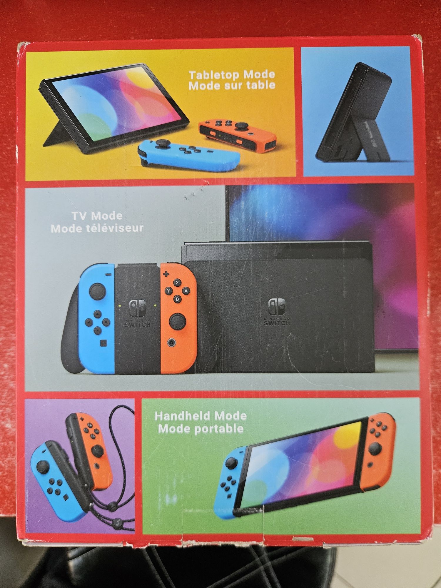 Nintendo Switch OLED with Neon Blue and Neon Red Joy-Con