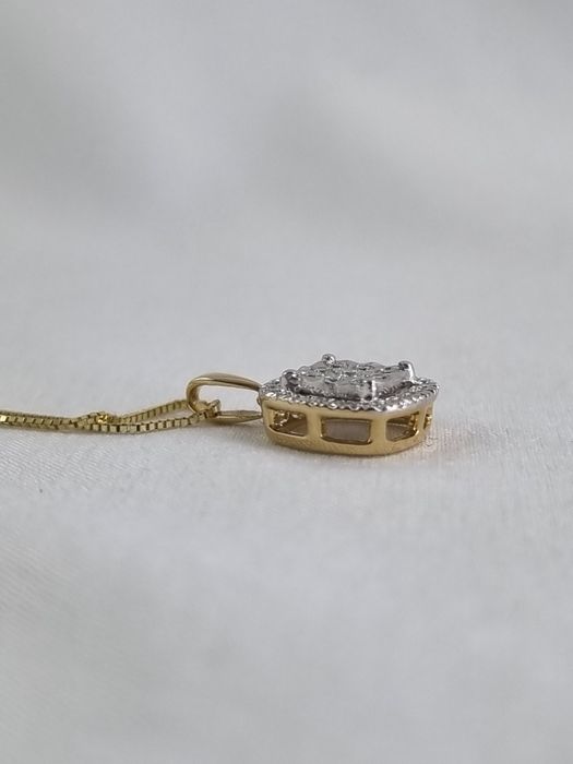 Złota zawieszka z diamentami Au.585 0,13ct wisiorek z brylantami