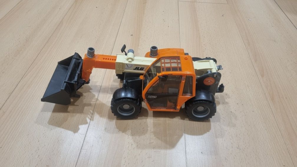 Ładowarka teleskopowa mini koparka BRUDER