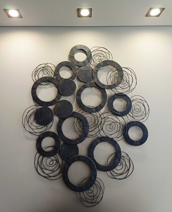 Peça decorativa metálica