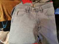 Spodnie  używane męskie jeansy  Armani  36