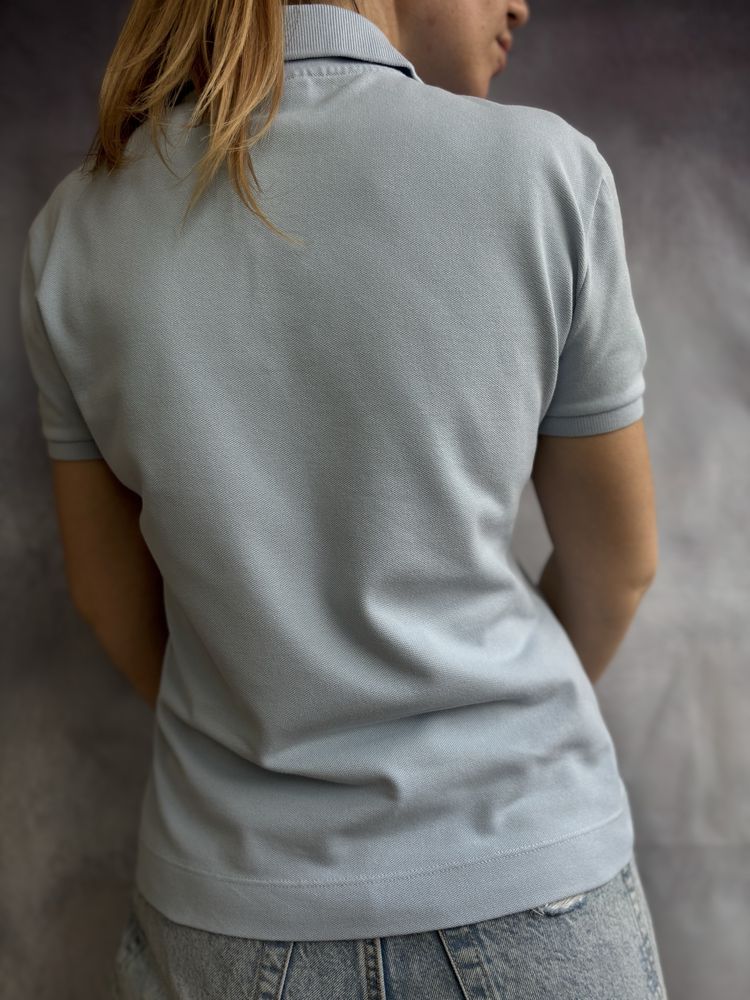 Жіноча футболка поло Lacoste блакитна