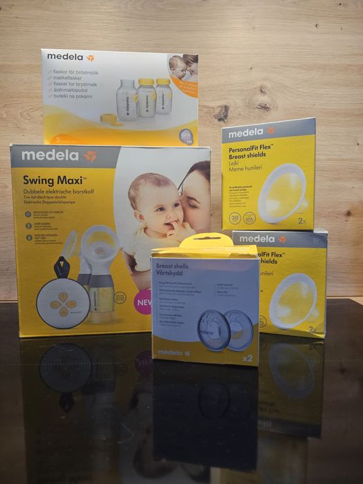 Laktator Medela Swing Maxi + dodatkowe akcesoria